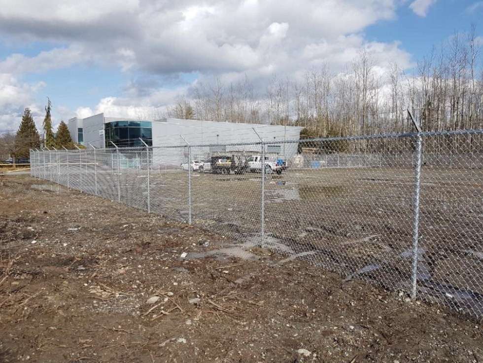 Galvanized chain-link industrial perimeter; LS project in Langley.