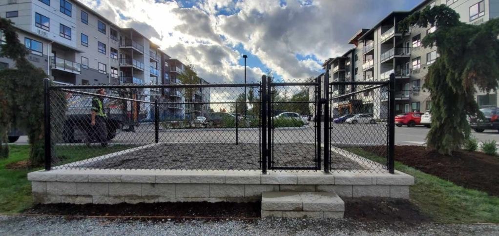 Black chain link around a playground; LS project in Chilliwack.